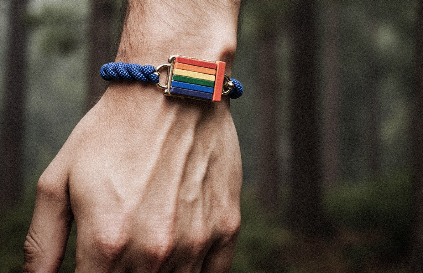 hand-with-rainbow-bracelet