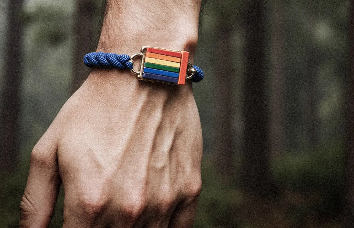 hand-with-rainbow-bracelet