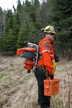 Crewmember with Pump and toolbox